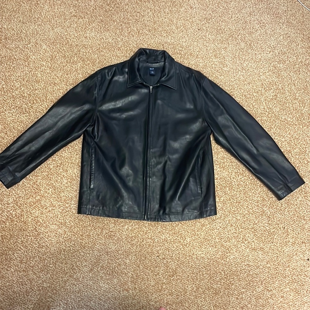 Men’s black leather jacket.